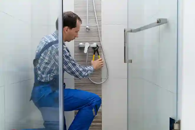 Plumber checking a shower system
